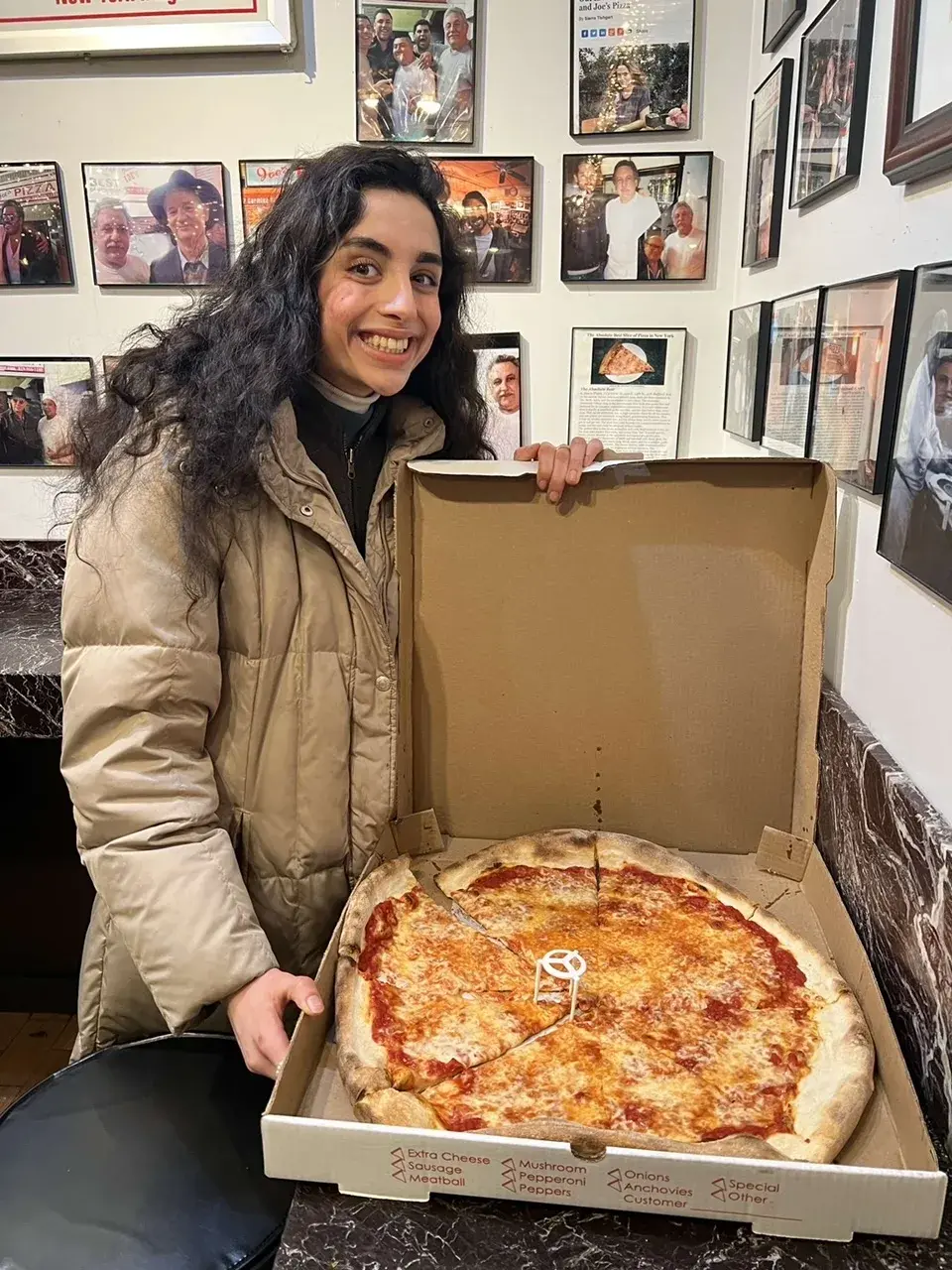 Deeva with Joe's cheese pizza