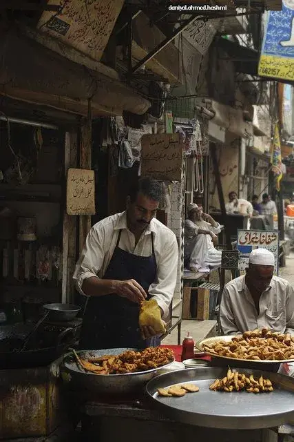 Man preparing chaat