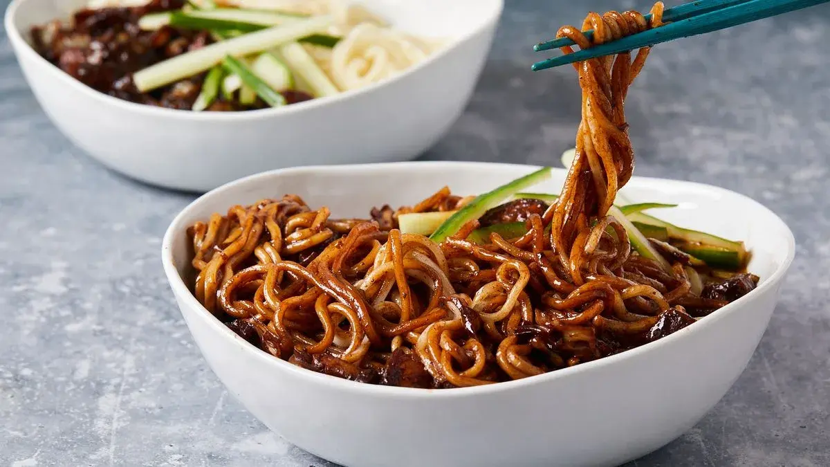 Bowl of jajangmyeon noodles with thick black bean sauce