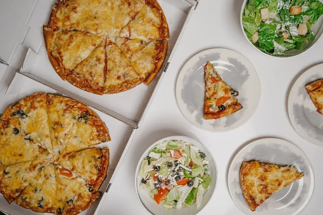 A Pizza Plus Pizzas and Salads
